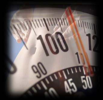 Weight loss symbol. Image of a scale with a woman's belly superimposed